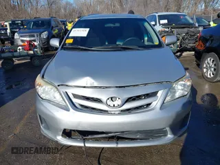 2011 Toyota Corolla L with VIN JTDBU4EE8B9167374, listed as a IAAI auction lot 41312318 with 189,903 mi miles. Bid and sale history available at carsss.com. Image 12.