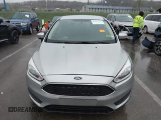 2017 Ford Focus SE with VIN 1FADP3F24HL303600, listed as a IAAI auction lot 41948159 with 95,212 mi miles and . Bid and sale history available at DreamBid. Image 13.