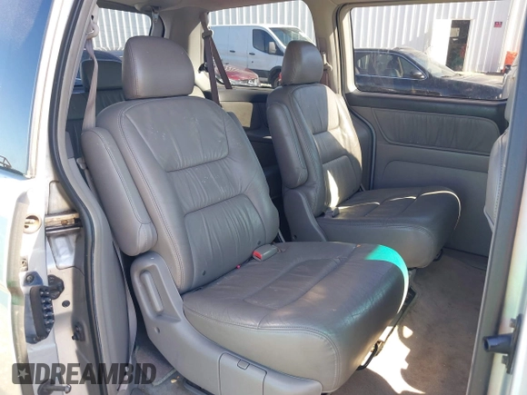 2004 Honda Odyssey EX-L with VIN 5FNRL18974B057715, listed as a IAAI auction lot 41762518 with 193,626 mi miles and . Bid and sale history available at DreamBid. Image 8.