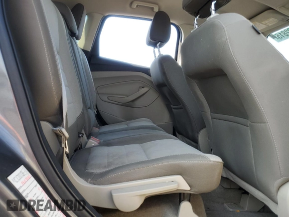 2014 Ford Escape SE z VIN 1FMCU9G97EUB34302, wystawiony jako Copart lot #61692815 z przebiegiem 158 068 mil mil oraz Czysty tytuł • Clean title. Historia ofert i sprzedaży dostępna na DreamBid. Obrazek 11.