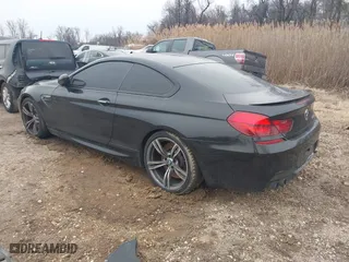 2014 BMW M6 with VIN WBSLX9C58ED160558, listed as a IAAI auction lot 41553209 with 154,789 mi miles. Bid and sale history available at carsss.com. Image 3.