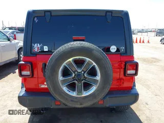 2019 Jeep Wrangler Unlimited Sahara with VIN 1C4HJXEN8KW591398, listed as a IAAI auction lot 42045071 with 87,410 mi miles and . Bid and sale history available at DreamBid. Image 16.