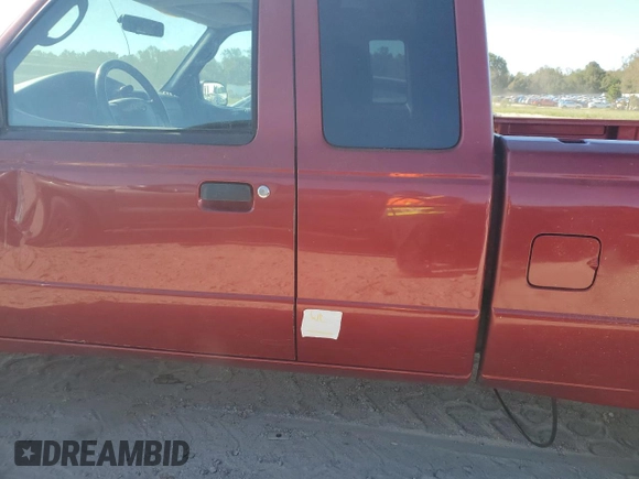 2005 Ford Ranger XLT with VIN 1FTYR44E05PA48098, listed as a Copart auction lot 75993294 with 139,897 mi miles and Salvage Title. Bid and sale history available at DreamBid. Image 12.