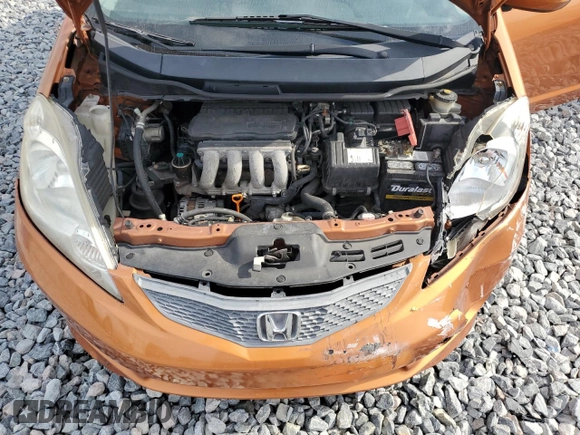 2011 Honda Fit Sport with VIN JHMGE8H59BC007883, listed as a Copart auction lot 54194635 with 123,256 mi miles and Salvage Title. Bid and sale history available at DreamBid. Image 11.