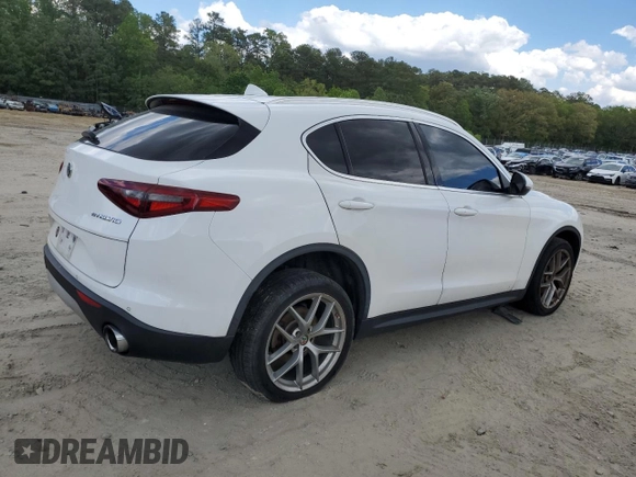 2018 Alfa Romeo Stelvio z VIN ZASFAKAN3J7B89286, wystawiony jako Copart lot #55717365 z przebiegiem 81 672 mil mil oraz Szkoda całkowita • Salvage title. Historia ofert i sprzedaży dostępna na DreamBid. Obrazek 3.