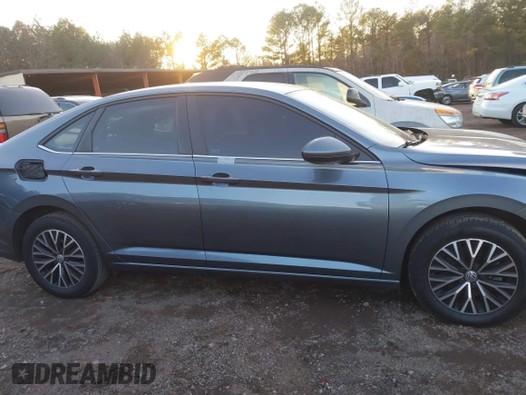 2021 Volkswagen Jetta S z VIN 3VWC57BU2MM023545, wystawiony jako IAAI lot #41285910 z przebiegiem 79 753 mil mil oraz . Historia ofert i sprzedaży dostępna na DreamBid. Obrazek 13.