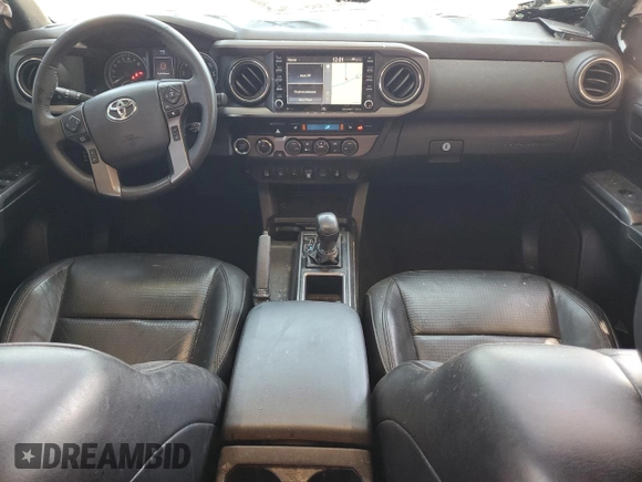 2020 Toyota Tacoma SR5 z VIN 3TMCZ5AN6LM310360, wystawiony jako Copart lot #55726645 z przebiegiem 106 262 mil mil oraz Szkoda całkowita • Salvage title. Historia ofert i sprzedaży dostępna na DreamBid. Obrazek 8.