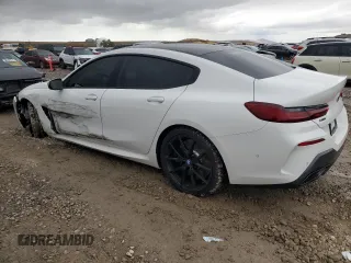 2020 BMW 8 Series M850i with VIN WBAGV8C05LCE00682, listed as a Copart auction lot 77863994 with 22,999 mi miles and Salvage Title. Bid and sale history available at carsss.com. Image 2.