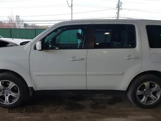 2014 Honda Pilot EX-L with VIN 5FNYF4H59EB047609, listed as a IAAI auction lot 42071353 with 148,661 mi miles and . Bid and sale history available at carsss.com. Image 13.
