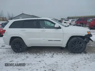 2018 Jeep Grand Cherokee Laredo E with VIN 1C4RJFAG1JC499457, listed as a IAAI auction lot 41379459 with 127,344 mi miles and . Bid and sale history available at DreamBid. Image 14.