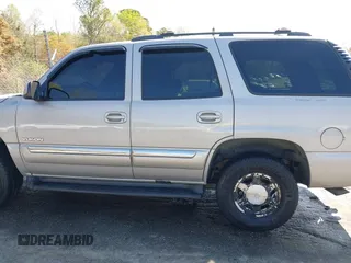 2005 GMC Yukon SLT with VIN 1GKEK13T25J251782, listed as a IAAI auction lot 41916555 with 262,546 mi miles. Bid and sale history available at carsss.com. Image 14.