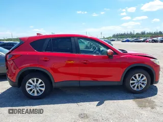 2016 Mazda CX-5 Touring with VIN JM3KE2CY6G0830409, listed as a IAAI auction lot 42049299 with 39,317 mi miles. Bid and sale history available at carsss.com. Image 13.