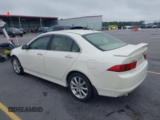 2007 Acura TSX with VIN JH4CL96817C004877, listed as a IAAI auction lot 42464309 with 299,459 mi miles and . Bid and sale history available at DreamBid. Image 3.