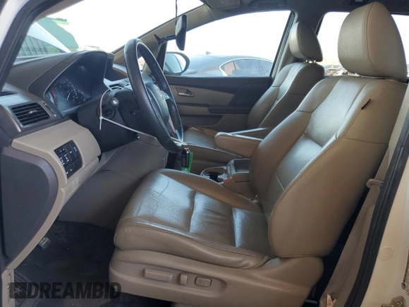 2014 Honda Odyssey Touring с VIN 5FNRL5H94EB110797, выставлен на аукционе Copart как лот 60702365 с пробегом 106 131 миль миль и Списание • Salvage title. История ставок и продаж доступна на DreamBid. Изображение 7.
