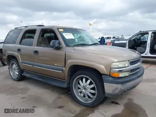 2003 Chevrolet Tahoe LS with VIN 1GNEC13V33J338251, listed as a IAAI auction lot 41634451 with 265,779 mi miles. Bid and sale history available at carsss.com. Image 1.