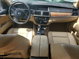 2012 BMW X5 35d with VIN 5UXZW0C51CL668064, listed as a Copart auction lot 62217845 with 140,544 mi miles and Salvage title. Bid and sale history available at DreamBid. Image 8.