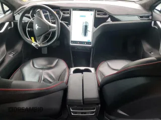 2014 Tesla Model S 60 with VIN 5YJSA1H10EFP60690, listed as a Copart auction lot 62515065 with 57,864 mi miles and Clean title. Bid and sale history available at DreamBid. Image 8.