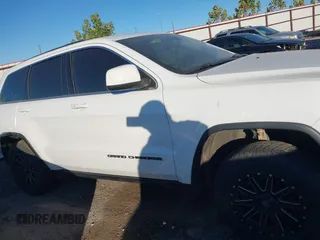 2017 Jeep Grand Cherokee Laredo with VIN 1C4RJEAG1HC903264, listed as a IAAI auction lot 40606675 with 144,106 mi miles. Bid and sale history available at carsss.com. Image 14.