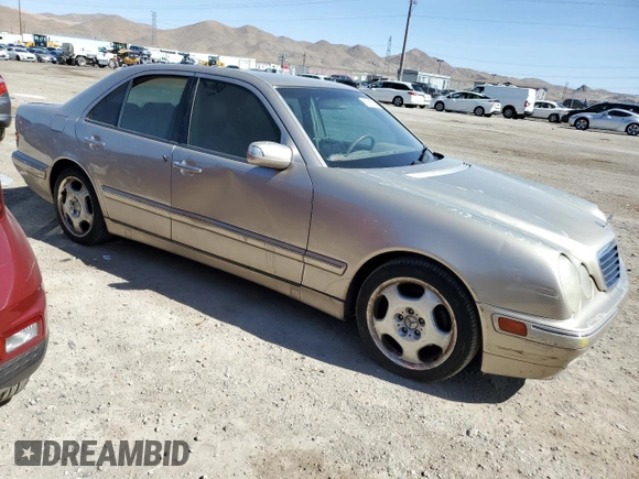 2001 Mercedes-Benz E-Class with VIN WDBJF70J71X052415, listed as a Copart auction lot 53858554 with 167,080 mi miles and Clean Title. Bid and sale history available at carsss.com. Image 4.