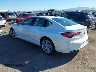 2021 Acura TLX Technology z VIN 19UUB5F48MA002731, wystawiony jako IAAI lot #41820962 z przebiegiem 30 747 mil mil oraz . Historia ofert i sprzedaży dostępna na DreamBid. Obrazek 3.
