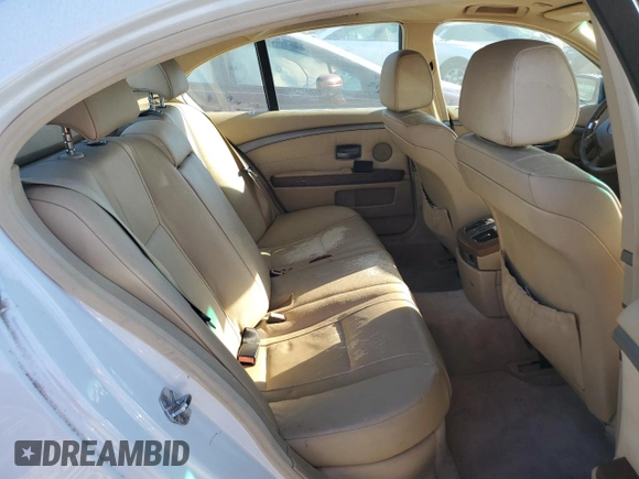2004 BMW 7 Series 745i with VIN WBAGL63484DP68795, listed as a Copart auction lot 77201084 with 134,044 mi miles and Salvage Title. Bid and sale history available at DreamBid. Image 10.