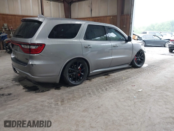 2017 Dodge Durango R/T with VIN 1C4SDJCT0HC799202, listed as a IAAI auction lot 42295142 with 83,103 mi miles and . Bid and sale history available at DreamBid. Image 4.