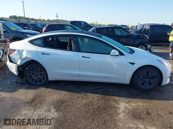2023 Tesla Model 3 Long Range with VIN 5YJ3E1EB6PF633550, listed as a IAAI auction lot 41861278 with 45,743 mi miles and . Bid and sale history available at DreamBid. Image 13.