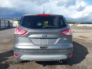 2013 Ford Escape SE with VIN 1FMCU9GX8DUC76686, listed as a IAAI auction lot 41809554 with 126,718 mi miles. Bid and sale history available at carsss.com. Image 16.