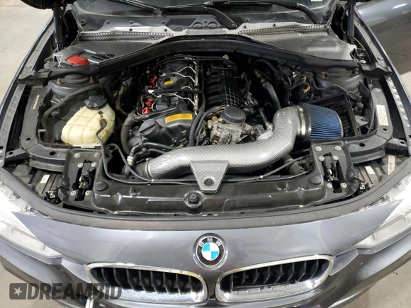 2014 BMW 3 Series 335i xDrive with VIN WBA3B9C59EP458568, listed as a Copart auction lot 61133085 with 177,009 mi miles and Salvage title. Bid and sale history available at DreamBid. Image 11.