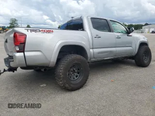 2019 Toyota Tacoma SR with VIN 3TMCZ5AN2KM193701, listed as a Copart auction lot 56776385 with 112,990 mi miles and Salvage title. Bid and sale history available at DreamBid. Image 3.