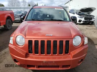 2010 Jeep Compass North Edition with VIN 1J4NF4FB0AD630982, listed as a Copart auction lot 50602465 with 233,513 mi miles and Clean Title. Bid and sale history available at carsss.com. Image 5.