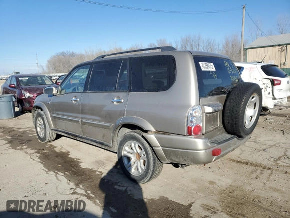 2004 Suzuki XL7 LX z VIN JS3TX92V344114452, wystawiony jako Copart lot #42338075 z przebiegiem 158 359 mil mil oraz Szkody całkowita. Historia ofert i sprzedaży dostępna na DreamBid. Obrazek 2.