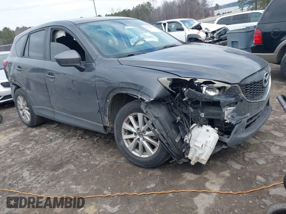 2015 Mazda CX-5 Touring with VIN JM3KE2CY2F0461935, listed as a IAAI auction lot 41430070 with 220,857 mi miles and . Bid and sale history available at DreamBid. Image 1.