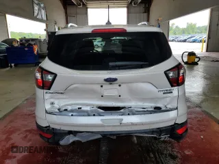 2018 Ford Escape Titanium с VIN 1FMCU9J90JUB30658, выставлен на аукционе Copart как лот 64001665 с пробегом 61 970 миль миль и Списание • Salvage title. История ставок и продаж доступна на DreamBid. Изображение 6.
