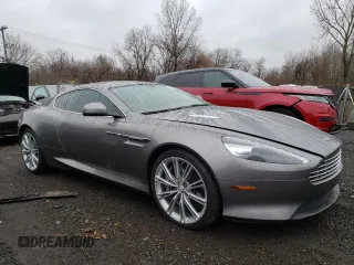 2015 Aston Martin DB9 z VIN SCFFDAEM9FGA16279, wystawiony jako Copart lot #81886554 z przebiegiem 25 029 mil mil oraz Szkody całkowita. Historia ofert i sprzedaży dostępna na DreamBid. Obrazek 4.