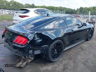 2021 Ford Mustang GT with VIN 1FA6P8CF0M5149169, listed as a IAAI auction lot 40151328 with 22,295 mi miles. Bid and sale history available at carsss.com. Image 4.
