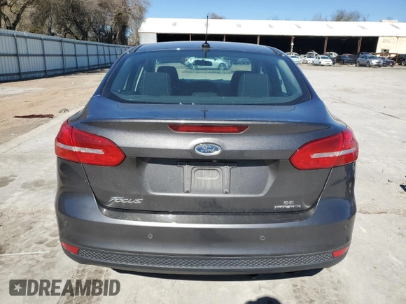 2015 Ford Focus SE с VIN 1FADP3F22FL299799, выставлен на аукционе Copart как лот 42420665 с пробегом 141 349 миль миль и Списание • Salvage title. История ставок и продаж доступна на DreamBid. Изображение 6.