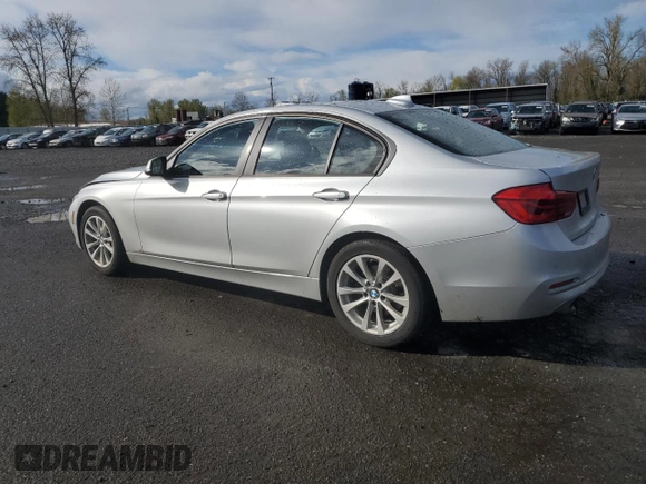 2018 BMW 3 Series 320i with VIN WBA8A9C57JAD27972, listed as a Copart auction lot 51279135 with 64,444 mi miles and Salvage title. Bid and sale history available at DreamBid. Image 2.