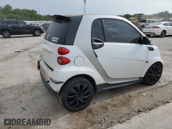 2013 Smart fortwo Pure с VIN WMEEJ3BA9DK618746, выставлен на аукционе Copart как лот 56752885 с пробегом 80 293 миль миль и Списание • Salvage title. История ставок и продаж доступна на DreamBid. Изображение 3.