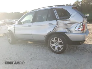 2000 BMW X5 4.4i with VIN WBAFB3355YLH05755, listed as a Copart auction lot 77136744 with 0 mi miles and Salvage Title. Bid and sale history available at carsss.com. Image 2.