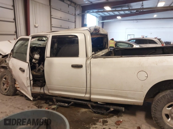 2011 Ram 2500 Laramie with VIN 3D7UT2CL9BG619372, listed as a IAAI auction lot 41252123 with 325,172 mi miles and . Bid and sale history available at DreamBid. Image 14.