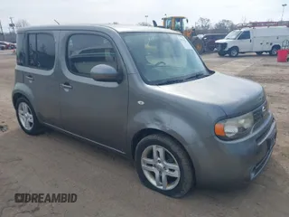 2010 Nissan Cube S z VIN JN8AZ2KR5AT155732, wystawiony jako IAAI lot #41774553 z przebiegiem 136 092 mil mil oraz . Historia ofert i sprzedaży dostępna na DreamBid. Obrazek 1.