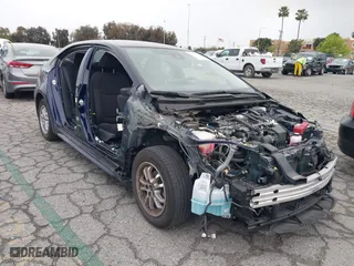 2020 Toyota Corolla Hybrid LE with VIN JTDEBRBE8LJ022596, listed as a IAAI auction lot 41772107 with 49,563 mi miles. Bid and sale history available at carsss.com. Image 6.