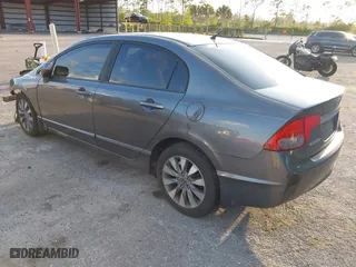 2010 Honda Civic Sdn EX with VIN 19XFA1F80AE026715, listed as a IAAI auction lot 41887154 with 128,272 mi miles. Bid and sale history available at carsss.com. Image 3.