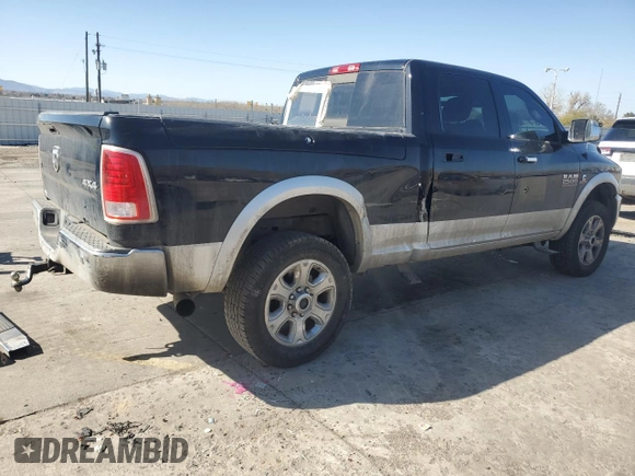 2014 Ram 2500 Laramie with VIN 3C6UR5FL2EG320582, listed as a Copart auction lot 52282625 with 216,745 mi miles and Salvage title. Bid and sale history available at DreamBid. Image 3.