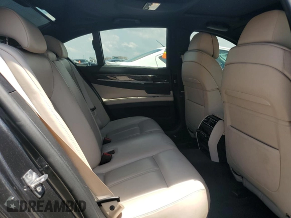 2011 BMW 7 Series 750i with VIN WBAKA8C59BCY36657, listed as a Copart auction lot 61484925 with 174,605 mi miles and Salvage title. Bid and sale history available at DreamBid. Image 10.