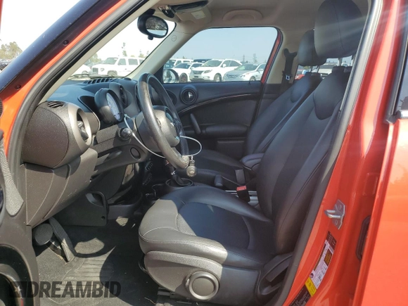 2012 MINI Countryman with VIN WMWZB3C59CWM06478, listed as a Copart auction lot 62547305 with 84,008 mi miles and Salvage title. Bid and sale history available at DreamBid. Image 7.