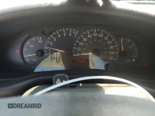 2001 Pontiac Sunfire SE z VIN 1G2JB124817315601, wystawiony jako Copart lot #63543704 z przebiegiem 147 535 mil mil oraz Szkody całkowita. Historia ofert i sprzedaży dostępna na DreamBid. Obrazek 9.