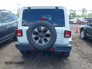2018 Jeep Wrangler Unlimited Sahara with VIN 1C4HJXEG1JW205789, listed as a IAAI auction lot 42435877 with 57,587 mi miles and . Bid and sale history available at DreamBid. Image 17.