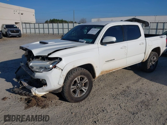 2018 Toyota Tacoma SR5 with VIN 3TMAZ5CN4JM062272, listed as a IAAI auction lot 41671472 with 114,566 mi miles and . Bid and sale history available at DreamBid. Image 2.